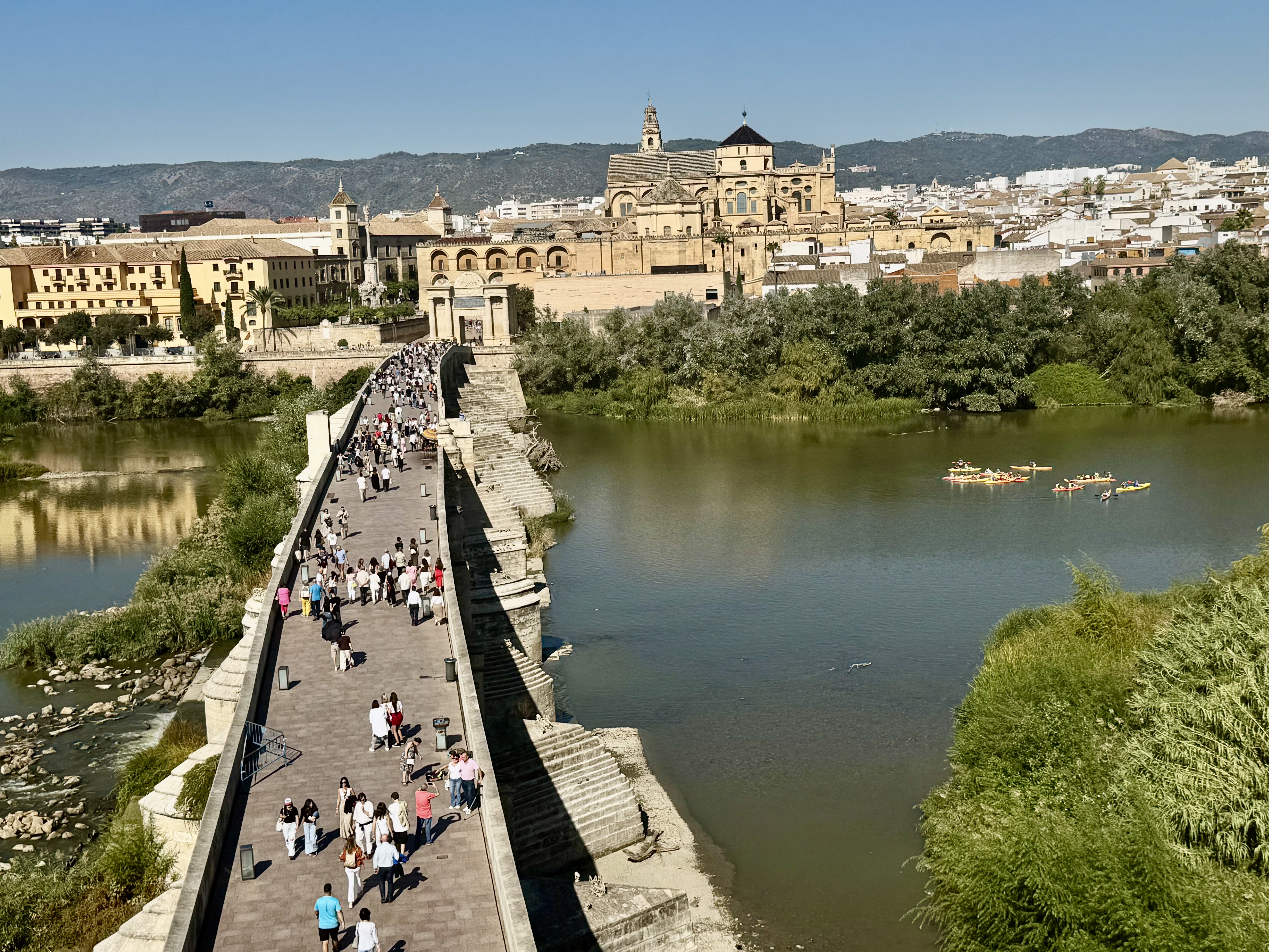 overhead view of pedestrian walkway over river