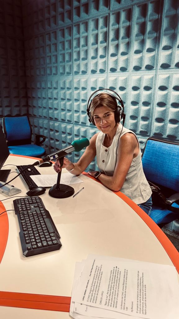 woman in radio studio with microphone