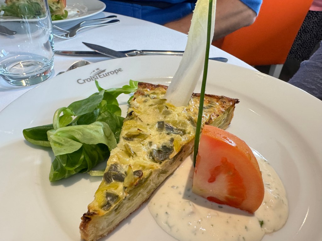 slice of quiche on a plate